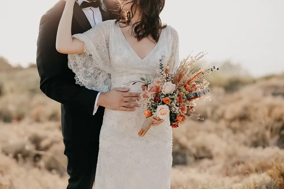 Bride and Groom with Wedding Bouquet