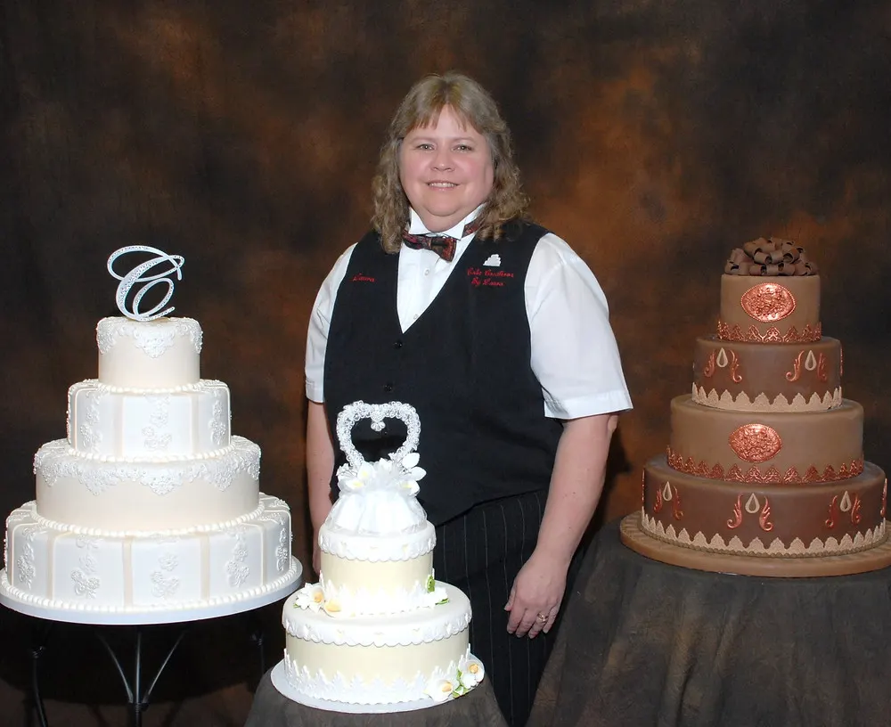 Laura with 3 Wedding Cakes