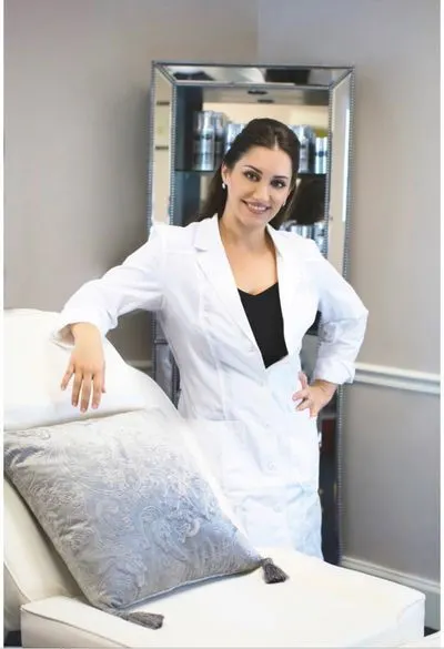 Owner Posing by Client Chair