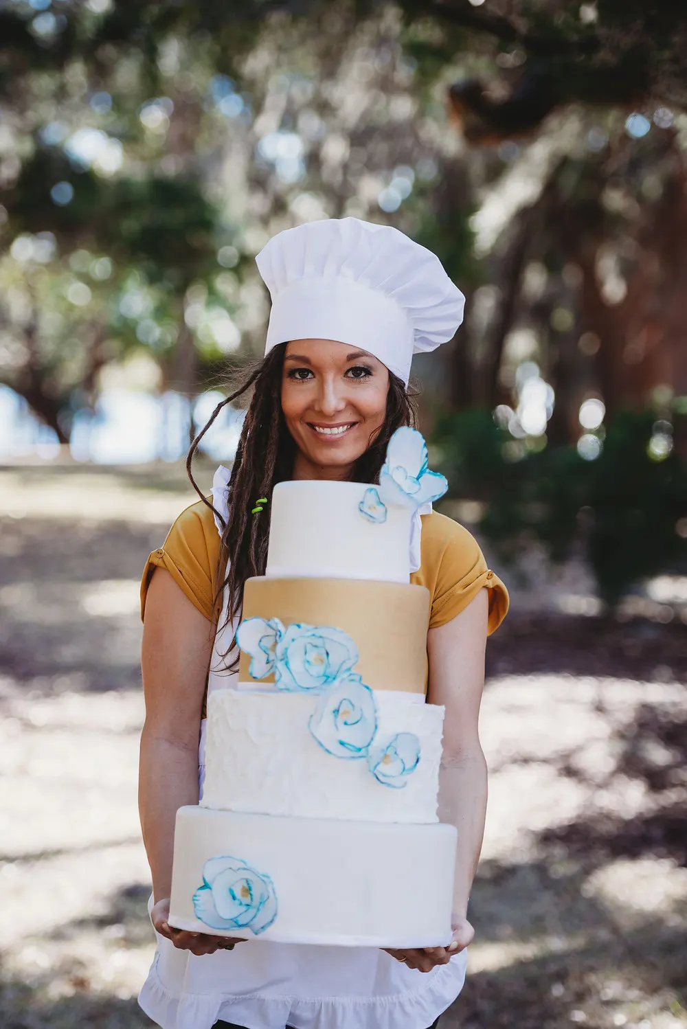 Baker Holding Cake